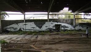 Street art in a derelict former whaling factory in Galicia - photo by Peri from ekosystem.com