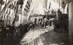 scrubbing deck sailing ship